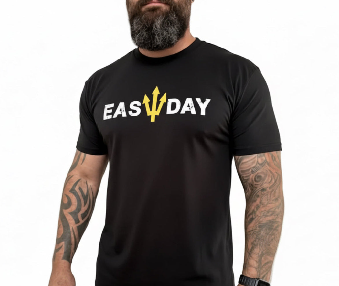 Person wearing a black t-shirt with 'EASY DAY' printed on it against a white background