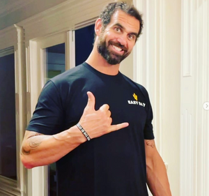 Veteran marcus capone in EASY DAY® Gold Trident Tee – home gym training